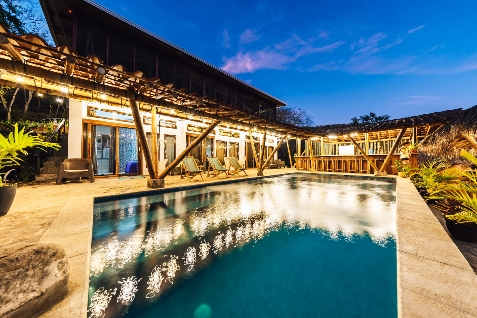 The pool at Sanctuary on the Beach in warm golden light